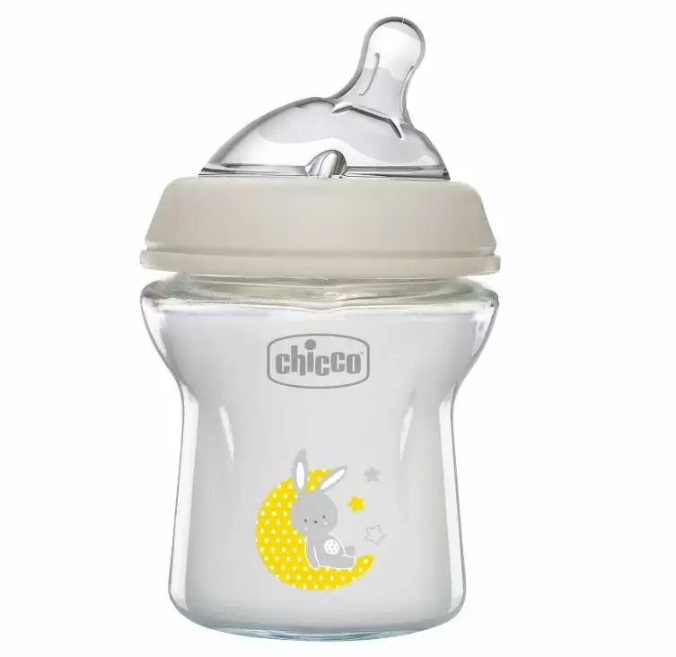 a small glass and silicon non toxic baby bottle by Chicco. The bottle features an image of a grey bunny laying on a crescent moon.